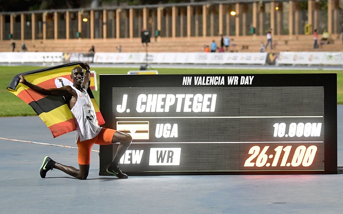 ugandan-athlete-joshua-cheptegei-waves-an-uganda-national-news-photo-1602107225