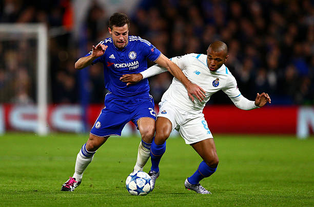 cesar-azpilicueta-of-chelsea-is-tackled-by-yacine-brahimi-of-fc-porto-picture-id500632012