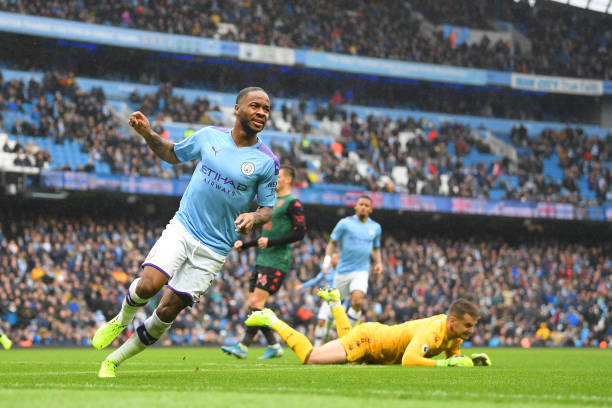 raheem-sterling-of-manchester-city-celebrates-scoring-the-first-goal-picture-id1183602815
