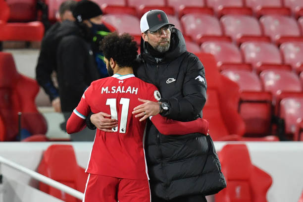 liverpools-german-manager-jurgen-klopp-consoles-liverpools-egyptian-picture-id1231287865