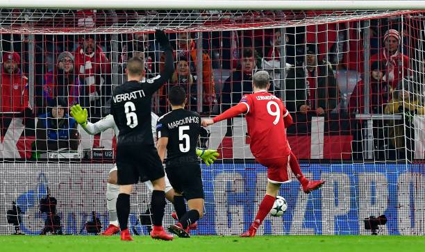 bayern-munichs-polish-forward-robert-lewandowski-scores-the-10-during-picture-id886447768