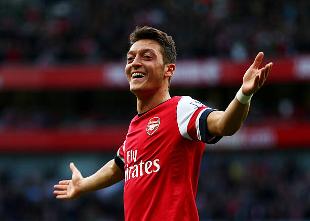 mesut-oezil-of-arsenal-celebrates-as-he-scores-their-second-goal-the-picture-id185347583