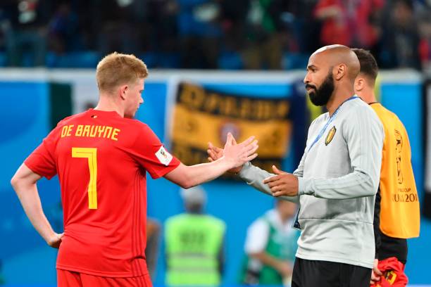 belgiums-french-assistant-coach-thierry-henry-comforts-belgiums-de-picture-id995643974